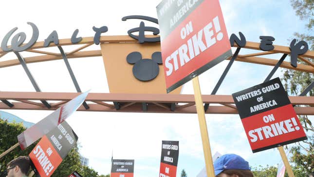 LOS ANGELES, CA - MAY 3: Members of the Writers Guild of America (WGA) and its supporters picket outside of Disney Studios on May 3, 2023 in Los Angeles, California. Hollywood writers have gone on strike in a dispute over payments for streaming services.
