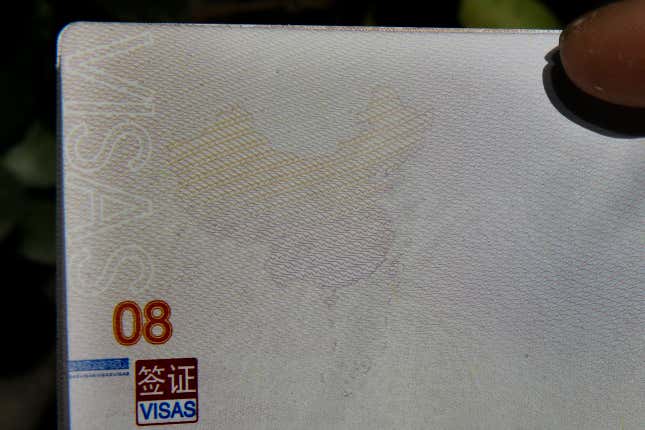Chinese passports issued from 2012 feature the dashed-line map around most of the South China Sea.