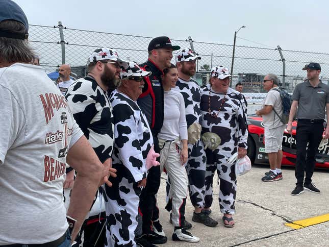 The guys wore the cow suits all weekend. Even for their picture with Porsche Driver Katherine Legge.