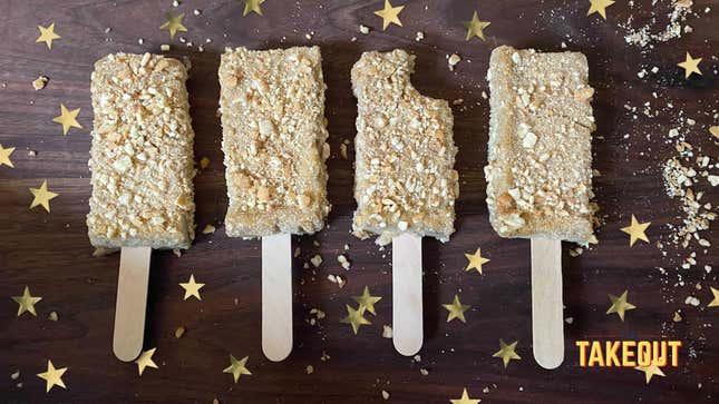 Four Banana Pudding Pops on wooden surface