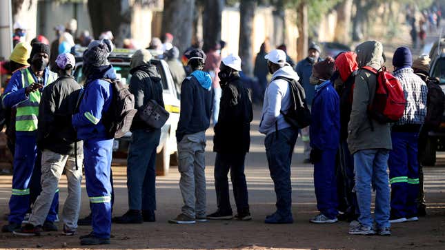 Jobseekers stand outside a construction site in Johannesburg in 2020.