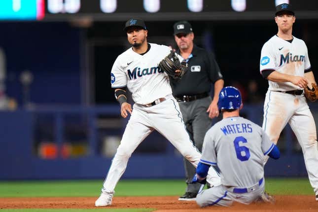 Jun 5, 2023; Miami, Florida, USA; Miami Marlins second baseman Luis Arraez (3) tags out Kansas City Royals center fielder Drew Waters (6) during the ninth inning at loanDepot Park.