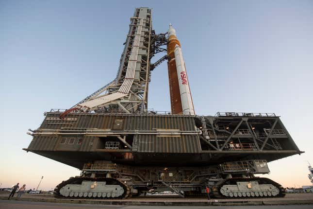 An impressive photo showing the crawler and SLS rocket. 