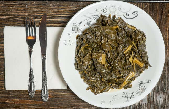 Plate of Collard Greens on wooden table