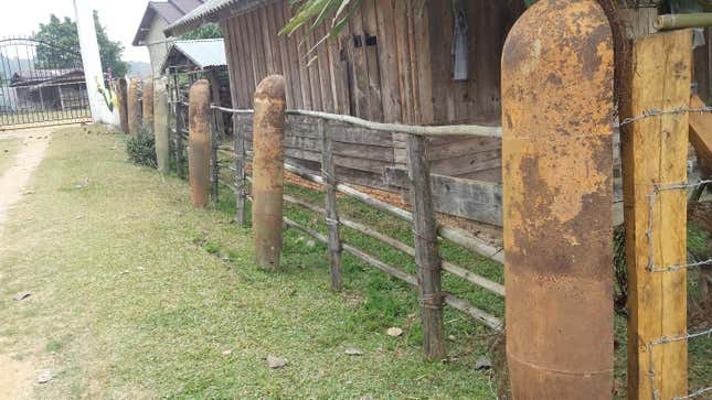 In Laos, bomb casings are used for everything from fence posts to flower pots.
