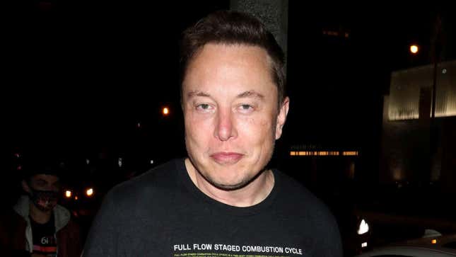Elon Musk wearing a shirt reading full flow staged combustion cycle.