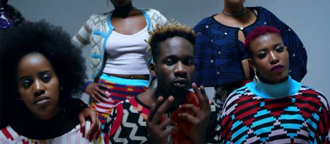 Mr Eazi(CENTER) IMAGE VIA YOUTUBE