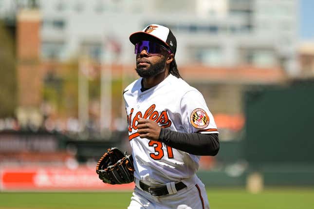 Apr 8, 2023; Baltimore, Maryland, USA;  Baltimore Orioles center fielder Cedric Mullins (31) run to the dugout before the game against the New York Yankees at Oriole Park at Camden Yards.