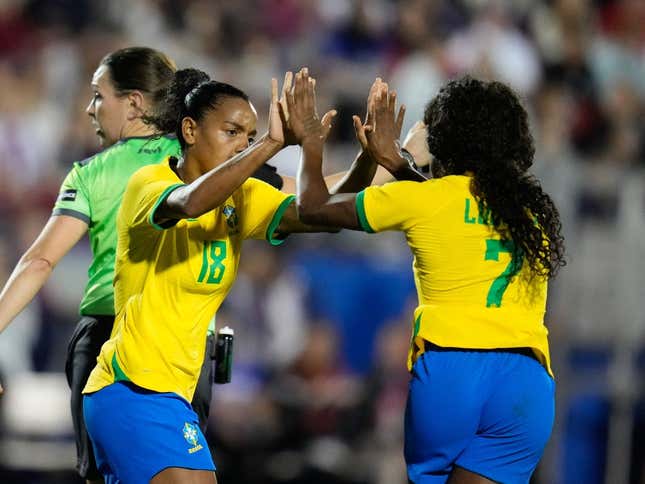 Feb 22, 2023; Frisco, Texas, USA; Brazil forward Ludmila (7) celebrates with forward Geyse (18) after scoring a goal during the second half at Toyota Stadium.