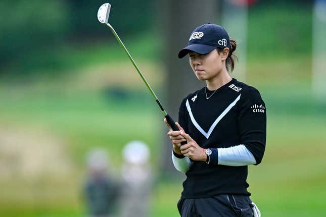 Jun 23, 2023; Springfield, New Jersey, USA; Danielle Kang lines up a shot from the bunker on the 18th hole during the second round of the KPMG Women&#39;s PGA Championship golf tournament.