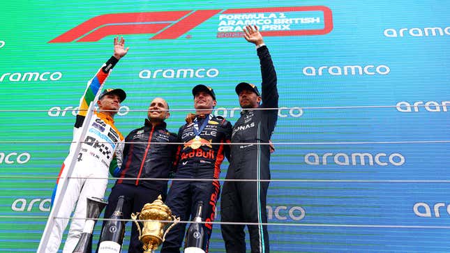 A photo of Max Verstappen, Lewis Hamilton and Lando Norris on the F1 podium. 