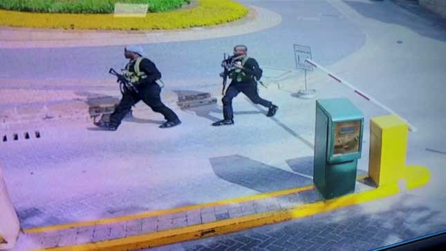 Two of the gunmen are pictured as they made their way into a hotel and office complex in Nairobi, Kenya, Jan. 15, 2019
