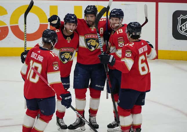 Mar 16, 2023; Sunrise, Florida, USA; Florida Panthers defenseman Aaron Ekblad (5) celebrates a goal with teammates in the second period against the Montreal Canadiens at FLA Live Arena.