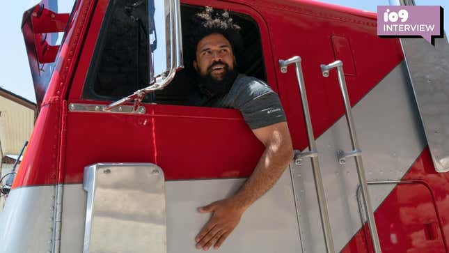 Transformers: Rise of the Beasts director Steven Caple Jr. driving Optimus Prime.