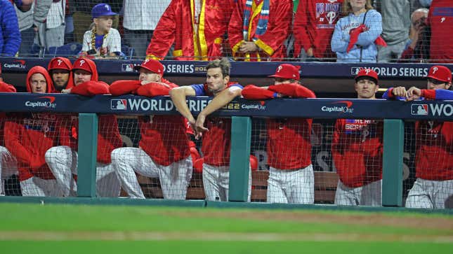 The Philadelphia Phillies dugout watches on during the 9th inning of World Series Game 4