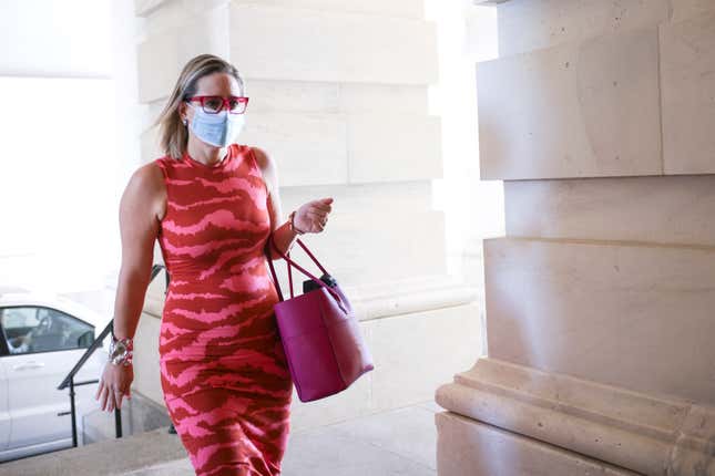 Image for article titled Commenting on Kyrsten Sinema&#39;s Clothes Is Not &#39;Sexist.&#39; They&#39;re Intended to Be a Distraction.