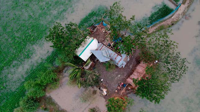 This aerial photo taken on November 10, 2019, shows a destroyed house after cyclone Bulbul hit Koyra, Bangladesh. 