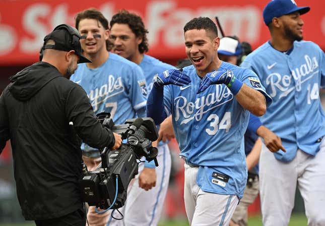 May 11, 2023; Kansas City, Missouri, USA;  Kansas City Royals catcher Freddy Fermin (34) reacts after driving in the winning run during the ninth inning against the Chicago White Sox at Kauffman Stadium.