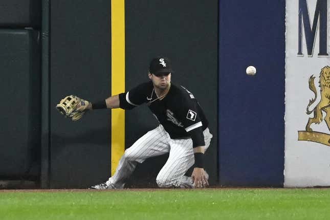 May 12, 2023; Chicago, Illinois, USA;  Chicago White Sox left fielder Andrew Benintendi (23) can t make the play on the ball hit by Houston Astros right fielder Kyle Tucker (30) during the fifth inning at Guaranteed Rate Field.