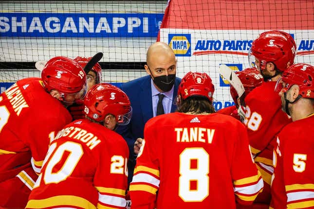 Mar 27, 2021; Calgary, Alberta, CAN; Calgary Flames assistant Coach Ryan Huska on his bench against the Winnipeg Jets during the third period at Scotiabank Saddledome.