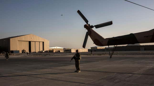 A member of the United States Air Force keeps watch over the runway on September 9, 2017, at Kandahar Air Field in Kandahar, Afghanistan.