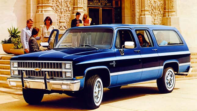 A vintage advert for the Chevrolet Suburban shows friends gathered round the truck 