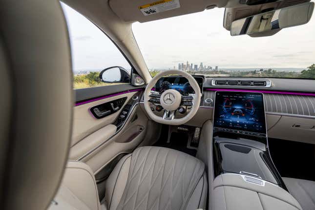 The interior of the 2024 Mercedes-AMG S63 E Performance as seen from over the driver's shoulder