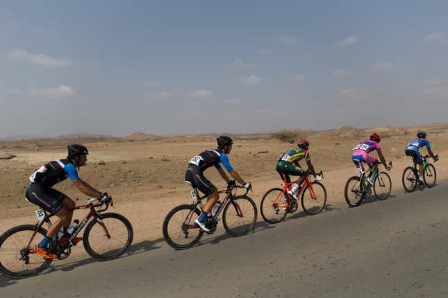 Riding out of Massawa on day 5, headed through desert for 4000m climb to Asmara