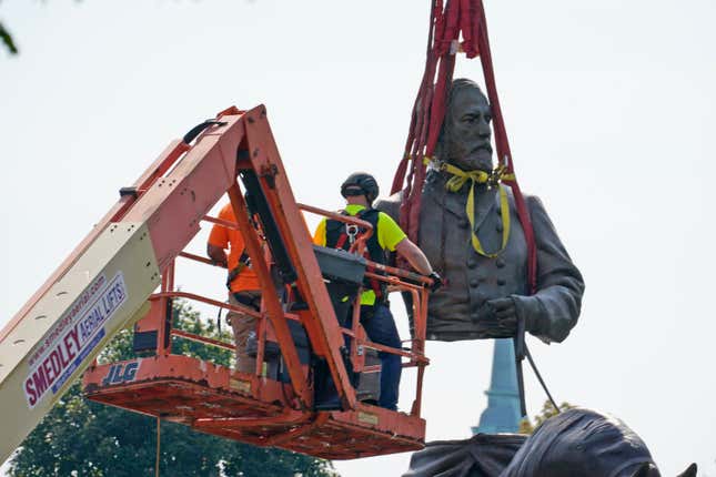 Crews remove the torso of Confederate General Robert E. Lee one of the country’s largest remaining monuments to the Confederacy, a towering statue on Monument Avenue in Richmond, Va., Wednesday, Sept. 8, 2021. 