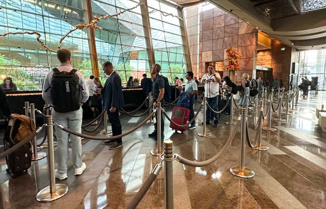 Long lines persist at the check-in for Aria Resort and Casino after MGM Resorts International suffered a cybersecurity attack, Monday, Sept. 11, 2023, in Las Vegas. (Daniel Pearson/Las Vegas Review-Journal via AP)