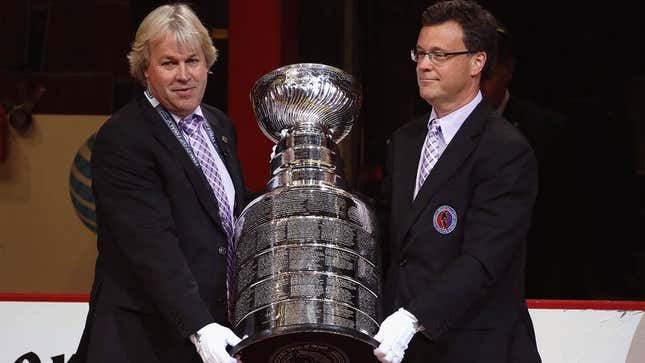 Image for article titled NHL Admits It Has No Idea Who Guys With White Gloves Transporting Stanley Cup Are