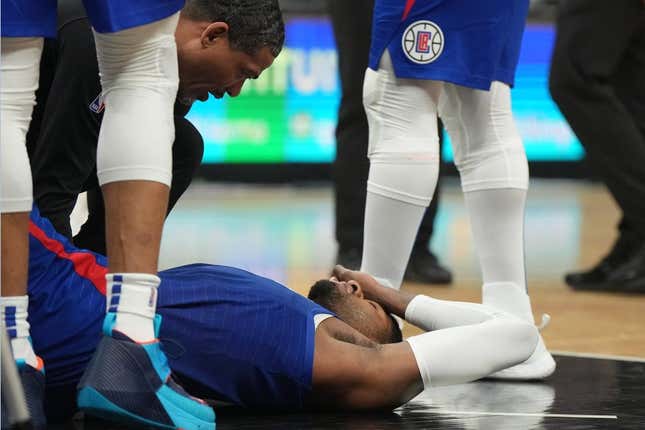 Mar 21, 2023; Los Angeles, California, USA; LA Clippers forward Paul George (13) reacts after suffering an injury against the Oklahoma City Thunder in the second half at Crypto.com Arena.