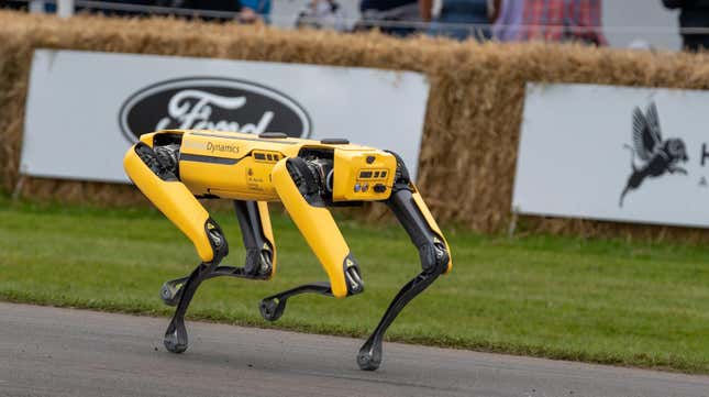 A Boston Dynamics robodog walks around. 