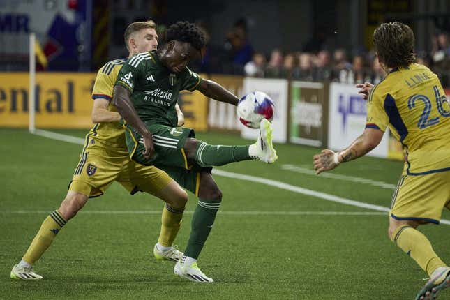 Aug 30, 2023; Portland, Oregon, USA; Portland Timbers midfielder Santiago Moreno (30) kicks the ball during the first half against Real Salt Lake defender Andrew Brody (2) at Providence Park.