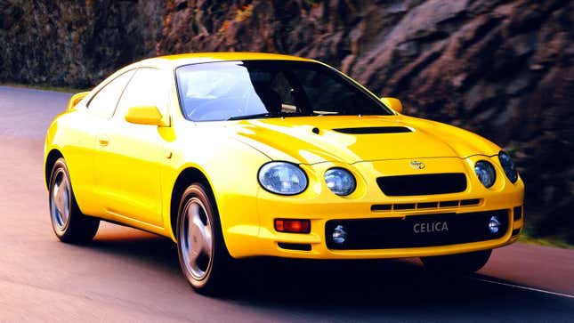 Image of a yellow Toyota Celica GT-Four driving on a mountain road