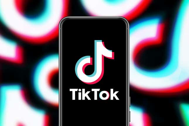 Tiktok's logo displayed on a phone