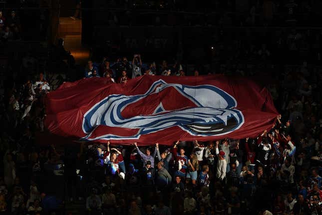 Jun 24, 2022; Denver, Colorado, USA; Colorado Avalanche fans raise a logo banner before game five of the 2022 Stanley Cup Final against the Tampa Bay Lightning at Ball Arena.