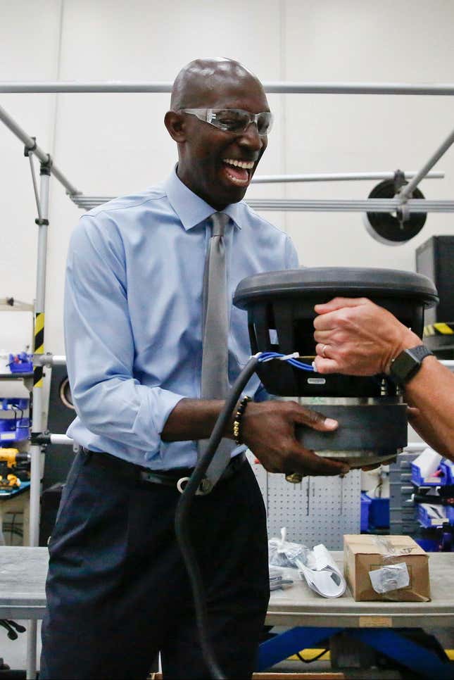 Messam on a factory tour, March 2019