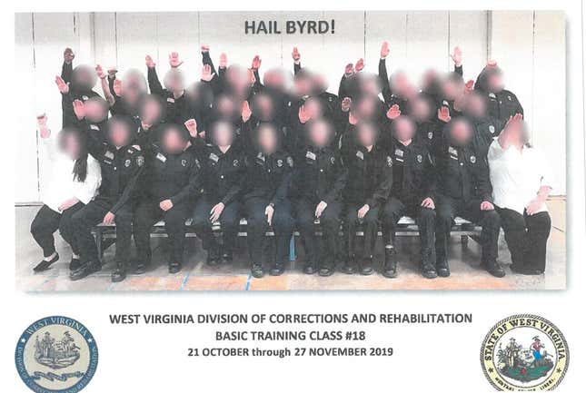 Image for article titled 3 Fired, 34 Suspended After Picture of Corrections Employees Making Nazi Salute Surfaces