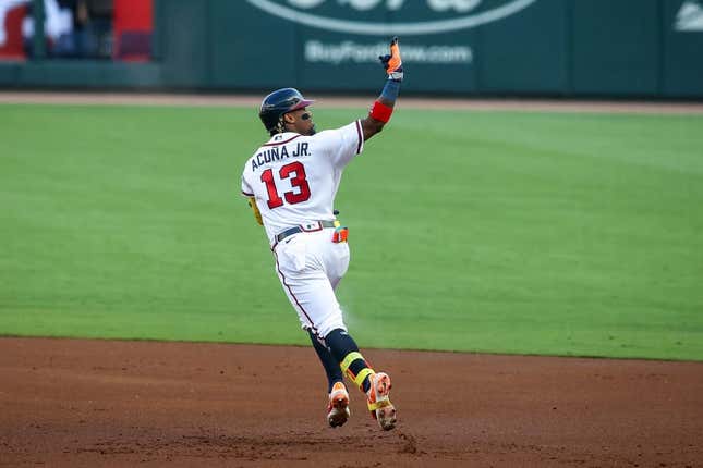 Jun 27, 2023; Atlanta, Georgia, USA; Atlanta Braves right fielder Ronald Acuna Jr. (13) reacts after a home run against the Minnesota Twins in the first inning at Truist Park.