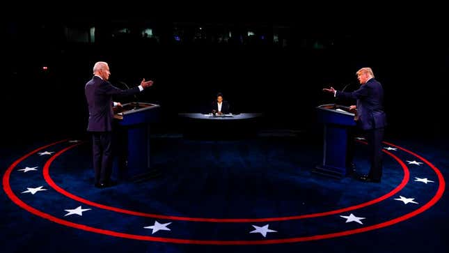 US President Donald Trump (R), Democratic Presidential candidate, former US Vice President Joe Biden, and moderator, NBC News anchor Kristen Welker (C) participate in the final presidential debate at Belmont University in Nashville, Tennessee, on October 22, 2020. 