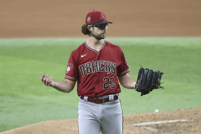 May 2, 2023; Arlington, Texas, USA; Arizona Diamondbacks starting pitcher Zac Gallen (23) reacts during the game against the Texas Rangers at Globe Life Field.