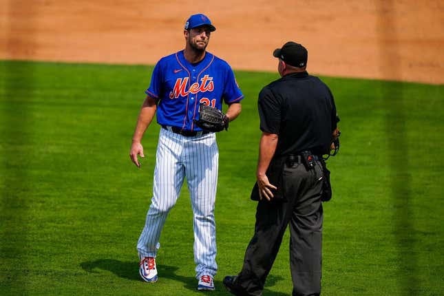 Mar 3, 2023; Port St. Lucie, Florida, USA; New York Mets starting pitcher Max Scherzer (21) speak to the umpire after being called for a balk on a quick pitch against the Washington Nationals during the second inning at Clover Park.
