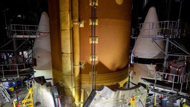 A view of SLS inside the Vehicle Assembly Building at NASA’s Kennedy Space Center, showing the tops of the side rocket boosters.