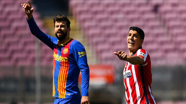  Gerard Pique of FC Barcelona and Luis Suarez of Atletico de Madrid during the La Liga Santander match between FC Barcelona and Atletico de Madrid at Camp Nou on May 08, 2021 in Barcelona, Spain. 