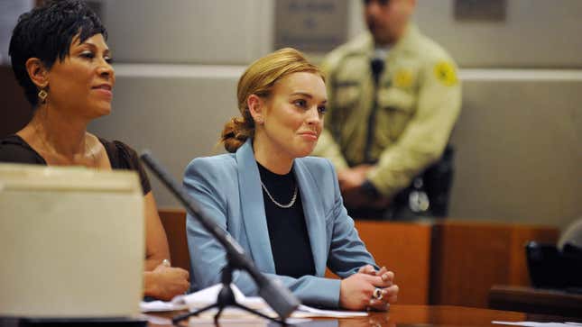 Actress Lindsay Lohan is shown in a courtroom. The SEC recently charged Lohan with illegally promoting crypto.