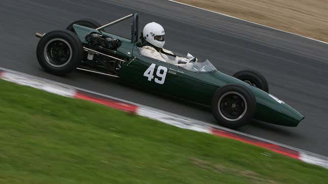 A photo of a vintage Brabham race car on track. 