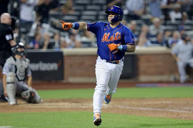Jul 18, 2023; New York City, New York, USA; New York Mets catcher Francisco Alvarez (4) points into the dugout as he rounds the bases after hitting a two run home run against the Chicago White Sox during the sixth inning at Citi Field.