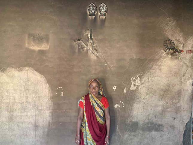 Nannu Bai Bhandole, in her ash-covered house.