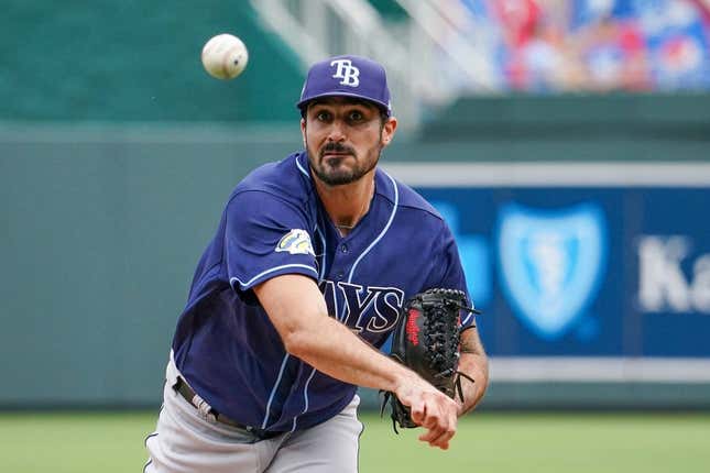 Jul 16, 2023; Kansas City, Missouri, USA; Tampa Bay Rays starting pitcher Zach Eflin (24) delivers a pitch against the Kansas City Royals prior to a game at Kauffman Stadium.